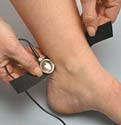 image of Small Radiac Disc, black wire, plug